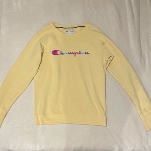 Selling a practically new yellow champion crew neck